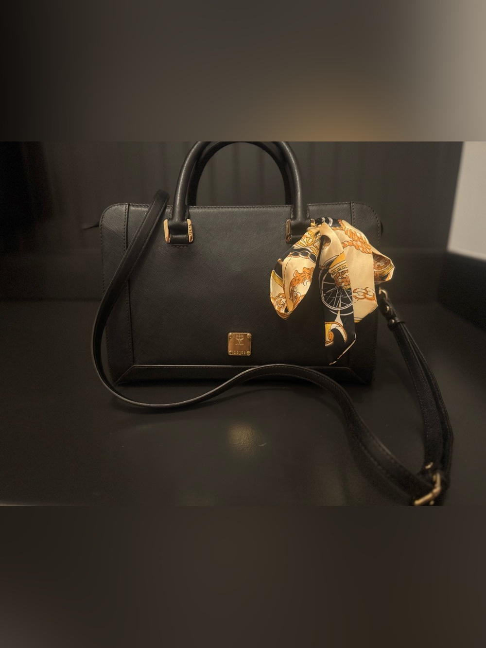 MCM Black Leather Satchel with Gold Hardware and Patterned Yellow Scarf